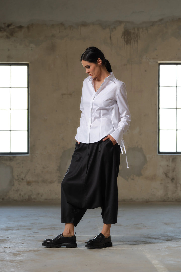 Black wool drop crotch winter pants with asymmetrical details