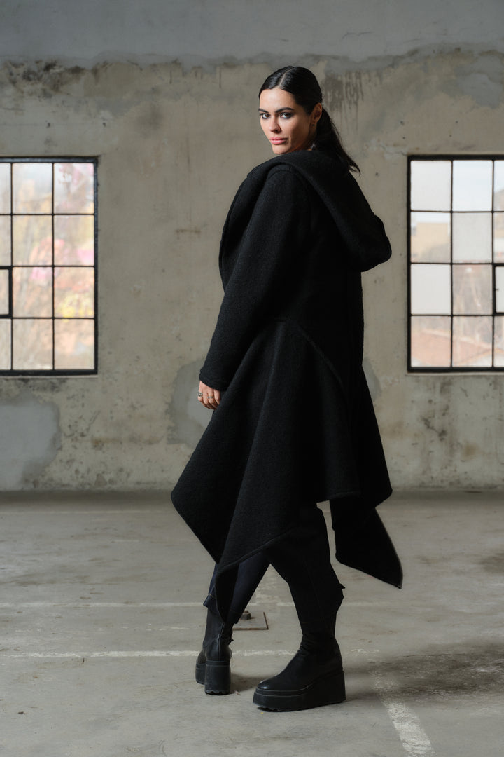 Long black wool coat for women with asymetrical hem