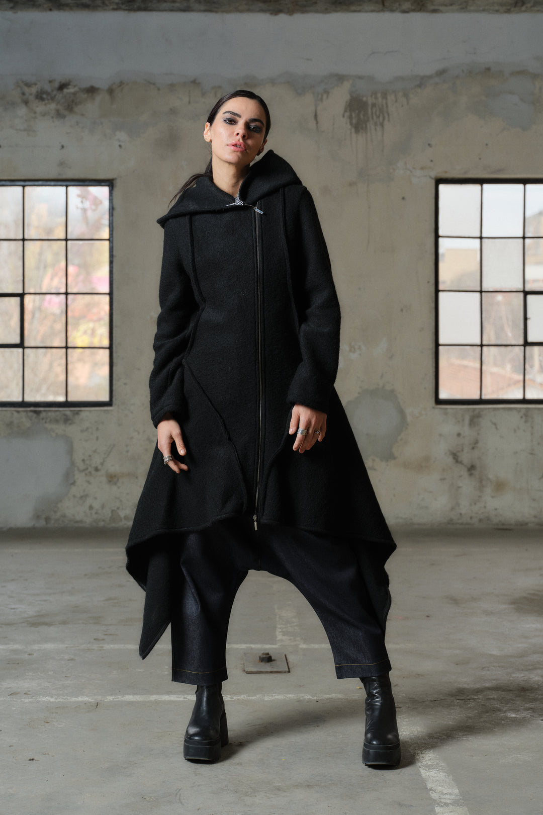 Asymmetrical wool coat with contrast accents