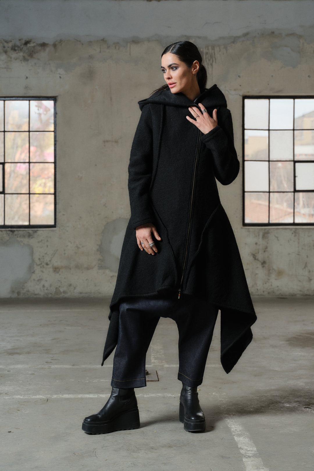 Asymmetrical wool coat with contrast accents