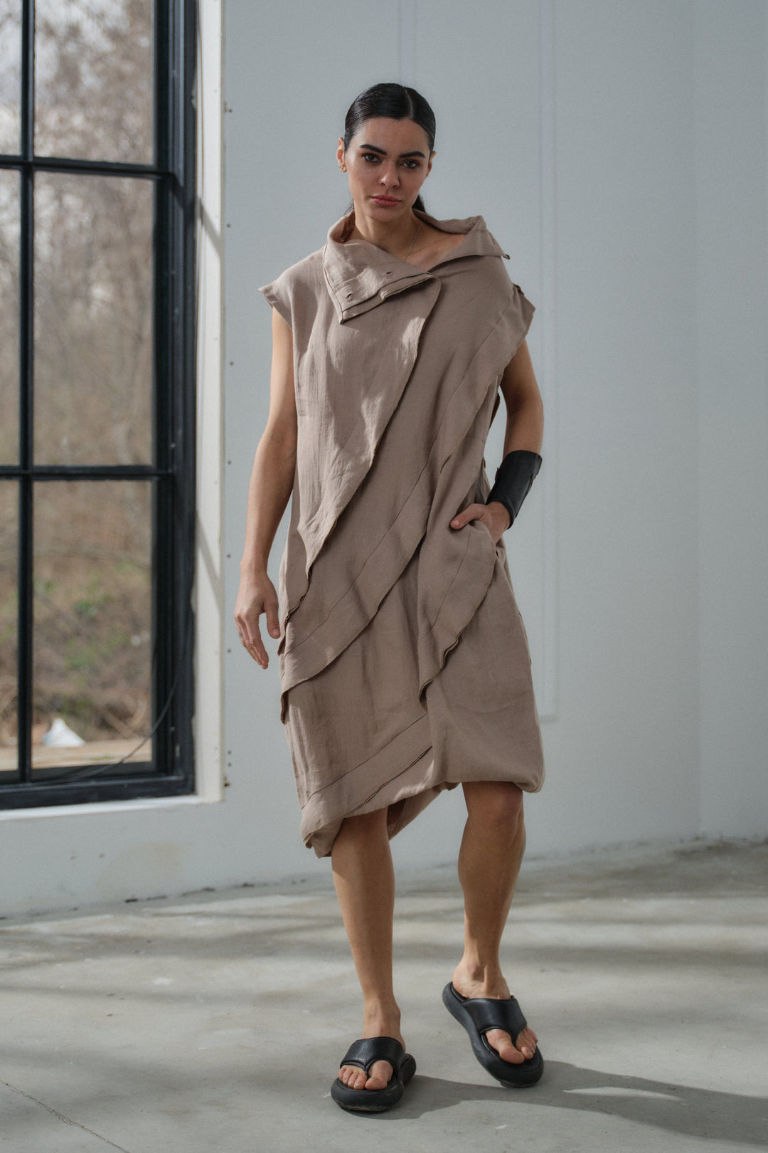 Asymmetrical beige linen dress with decorative ruffles