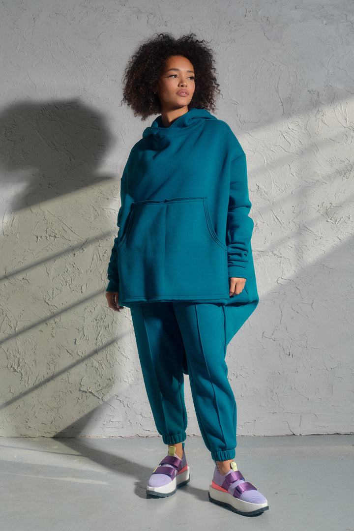 Asymmetrical organic cotton sweatshirt in Petrol blue