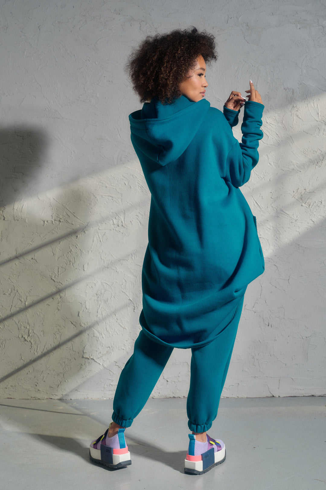 Asymmetrical organic cotton sweatshirt in Petrol blue