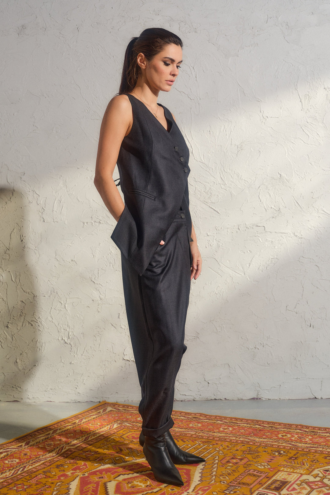 Merino wool baggy pants with asymmetrical details