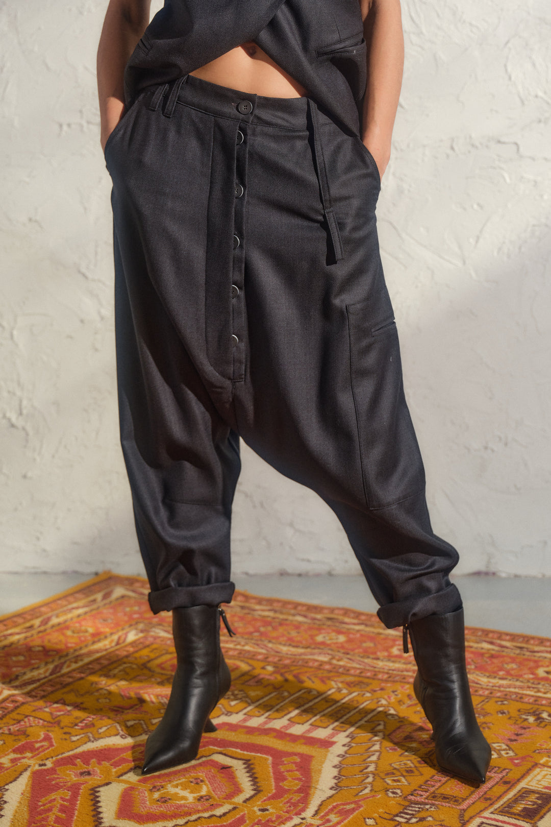 Merino wool baggy pants with asymmetrical details