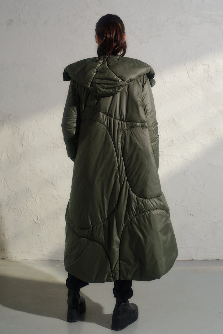 Avant garde transitional puffer jacket with hood