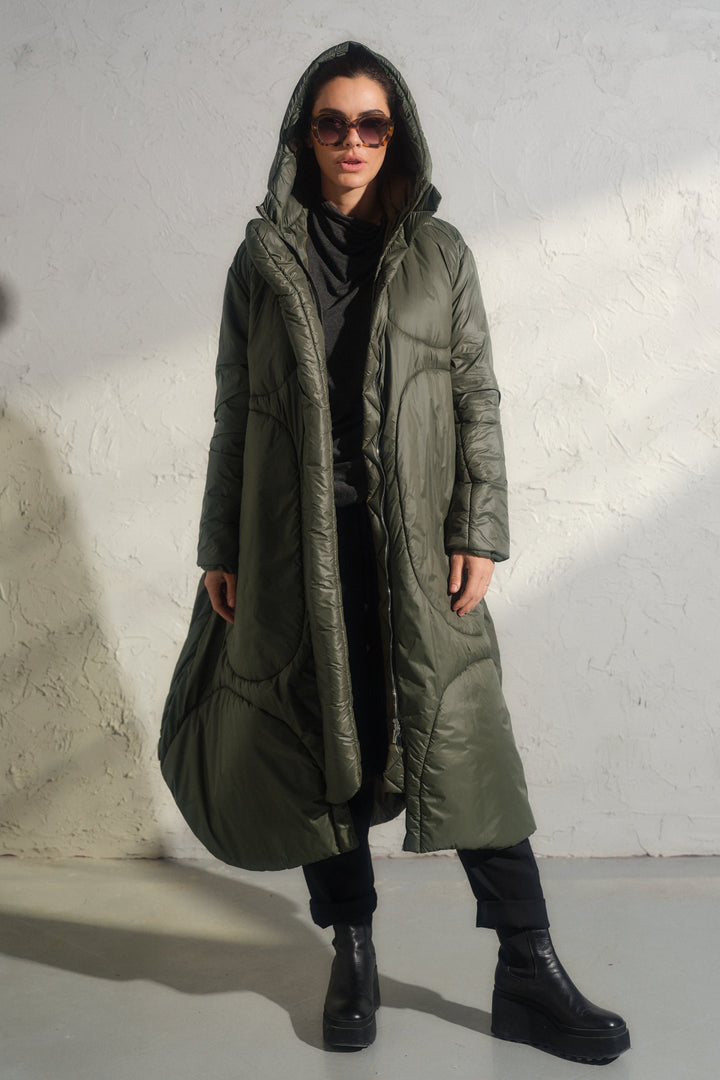 Avant garde transitional puffer jacket with hood