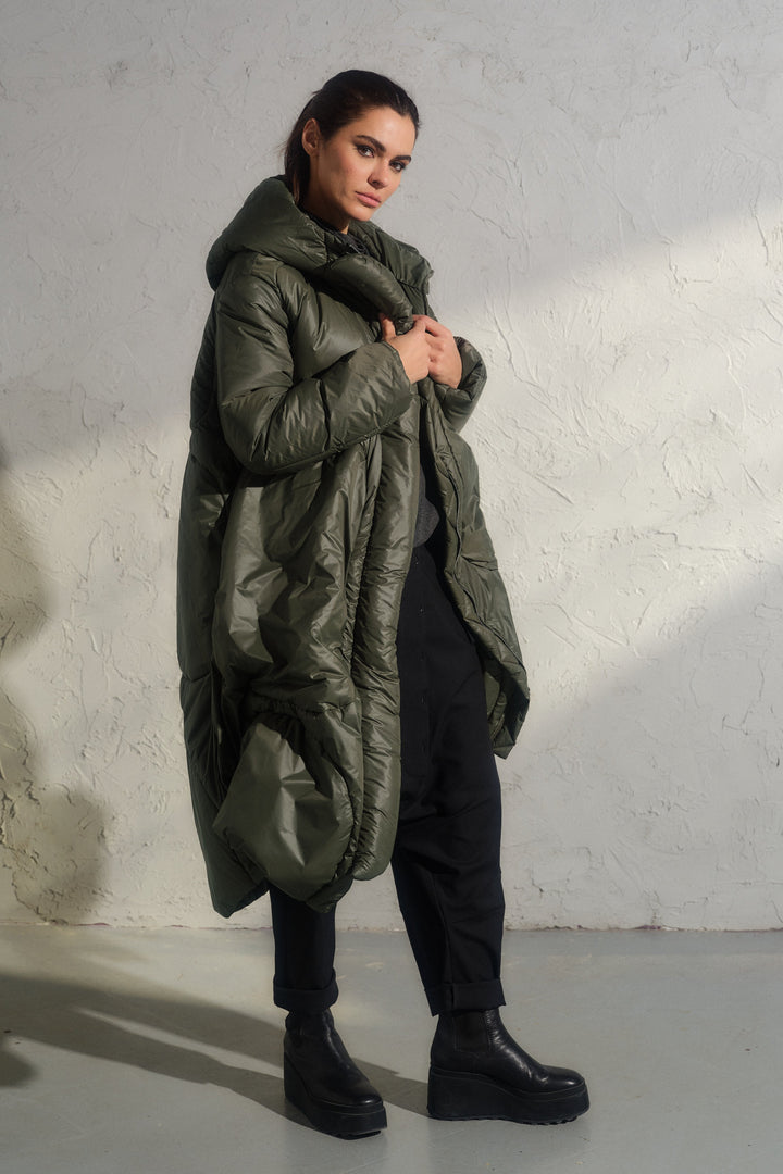 Avant garde transitional puffer jacket with hood