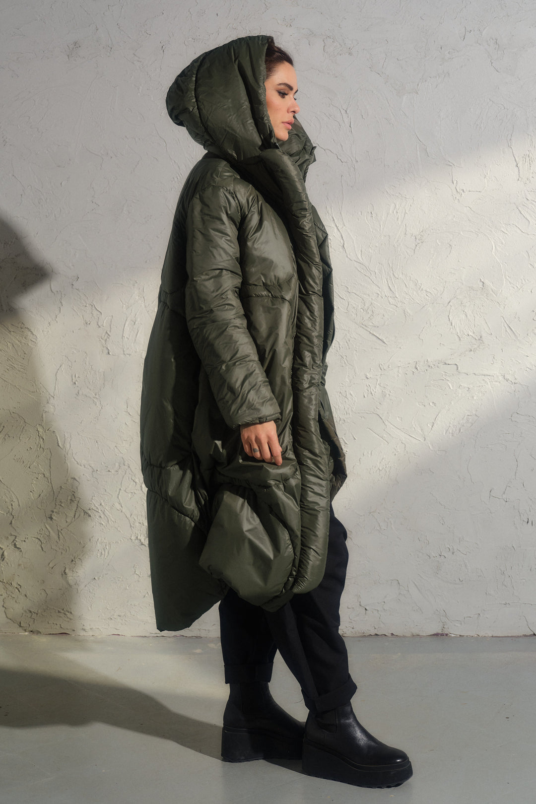 Avant garde transitional puffer jacket with hood