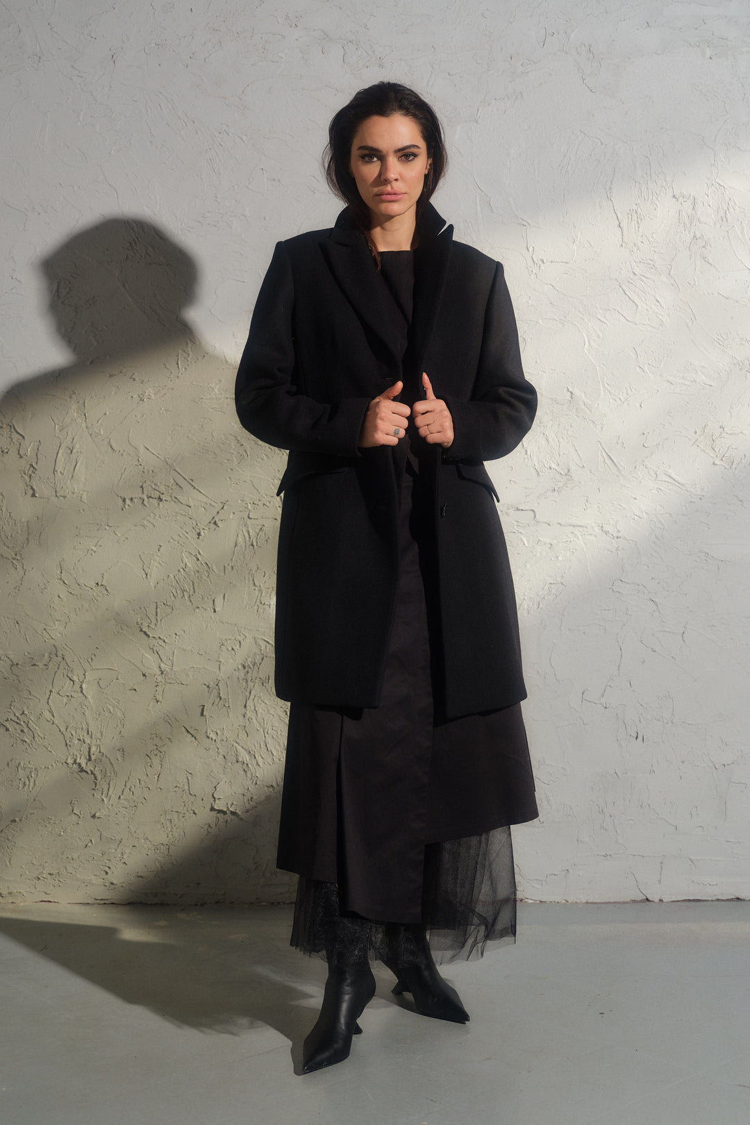Minimalistic black wool coat