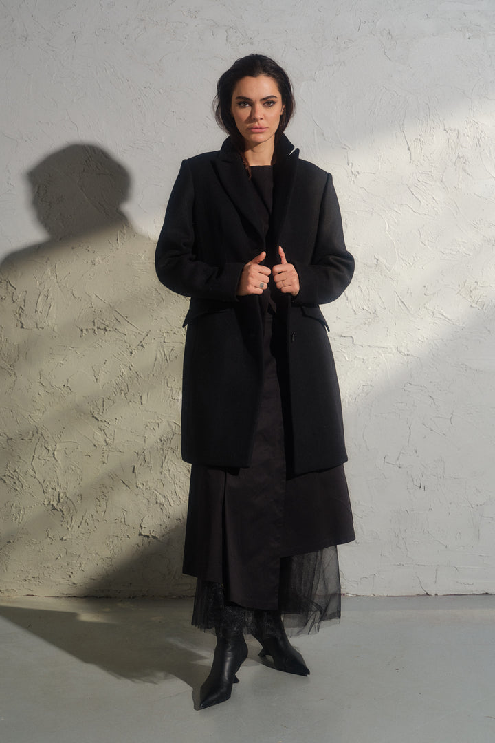 Minimalistic black wool coat