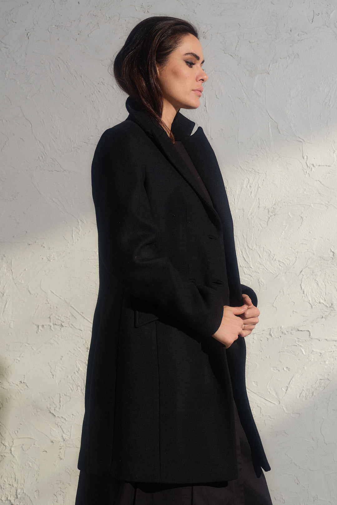 Minimalistic black wool coat