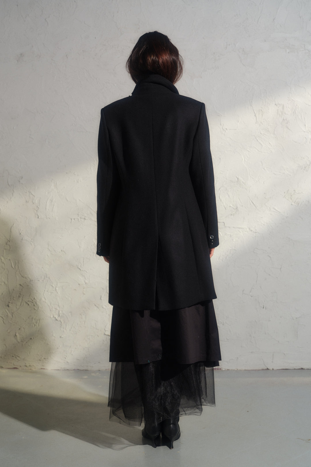 Minimalistic black wool coat