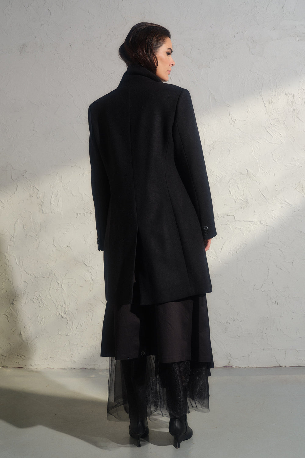 Minimalistic black wool coat