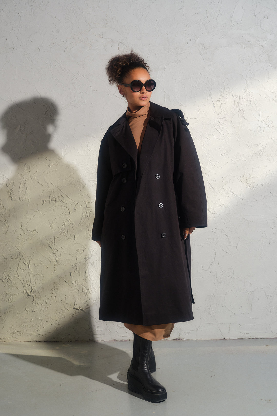 Double breasted trench coat in black