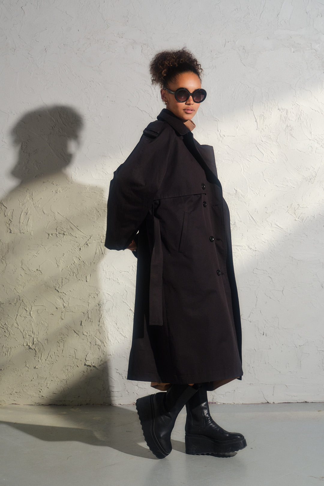 Double breasted trench coat in black