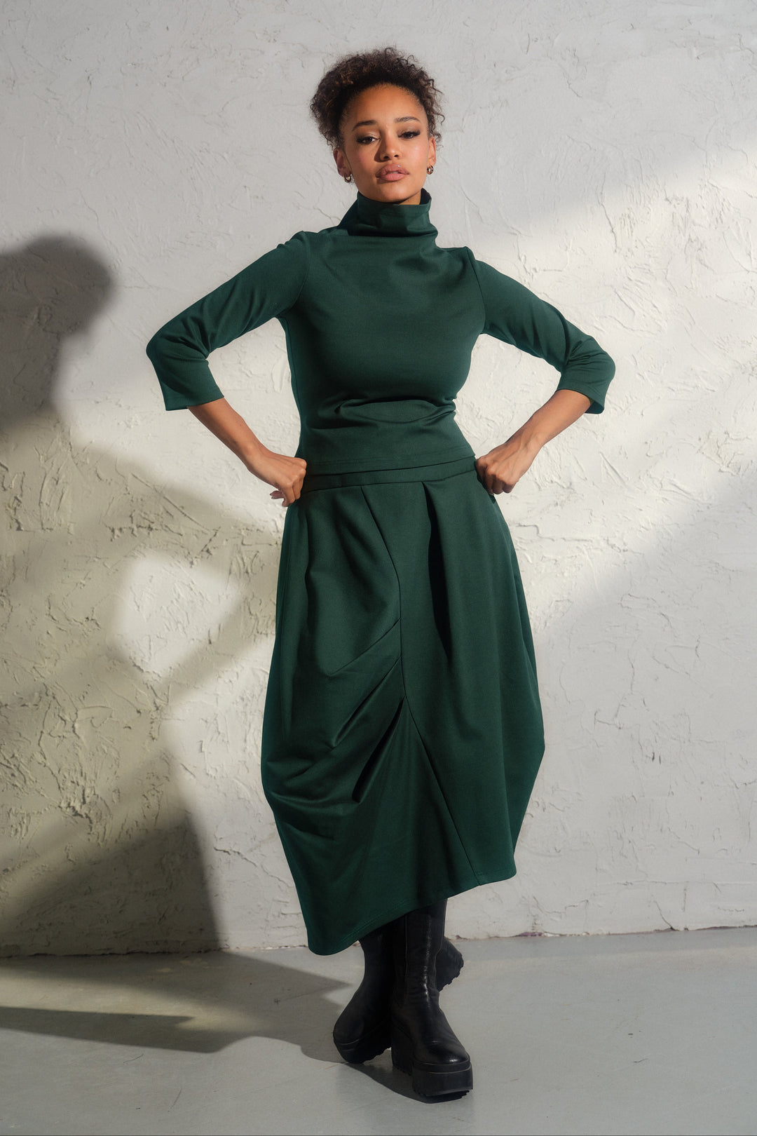 Asymmetrical viscose midi skirt in emerald green