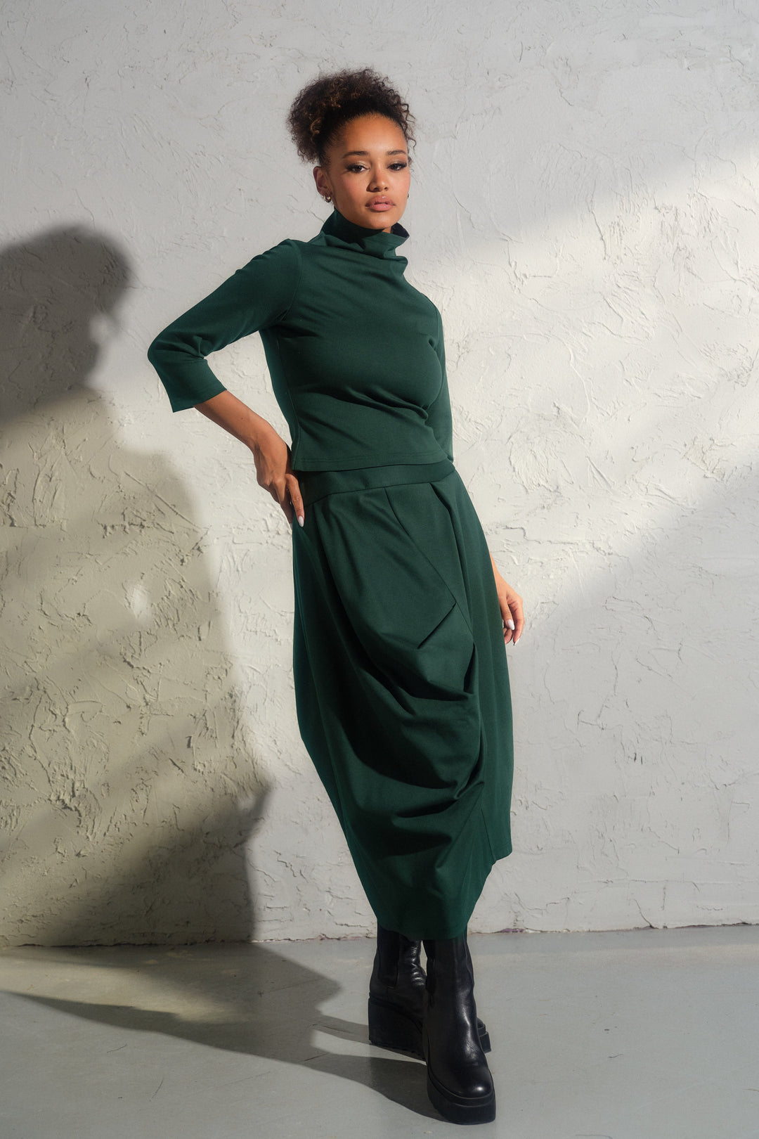 Avant garde viscose top in emerald green color