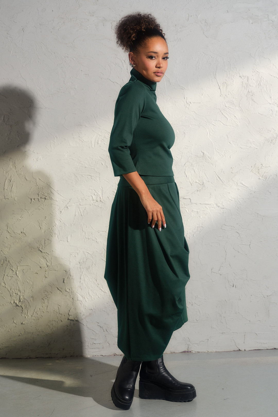 Avant garde viscose top in emerald green color