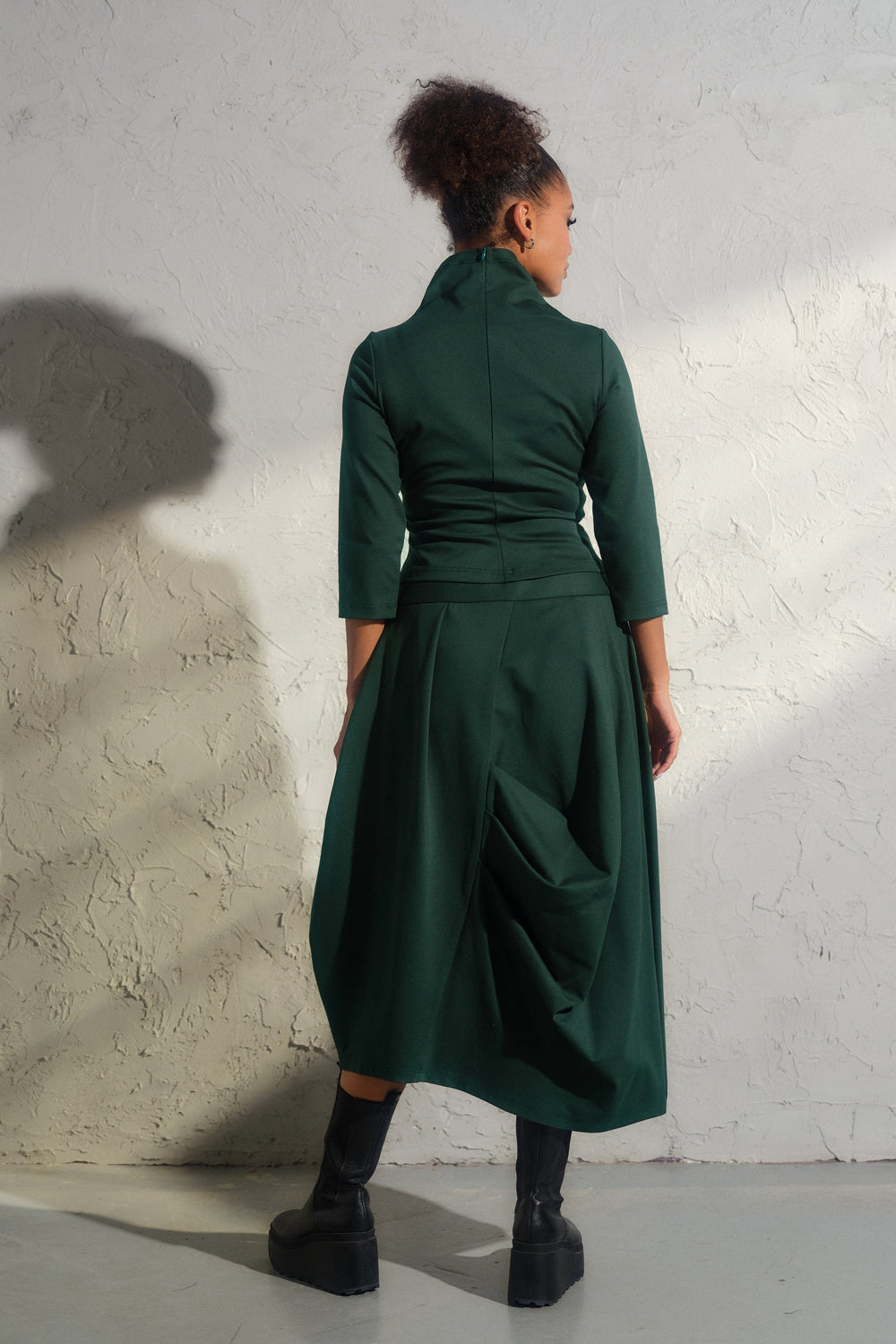 Asymmetrical viscose midi skirt in emerald green