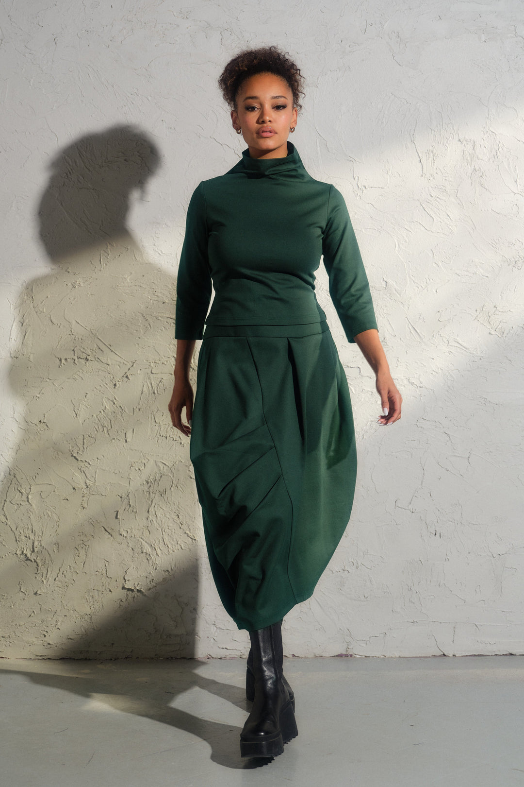 Asymmetrical viscose midi skirt in emerald green