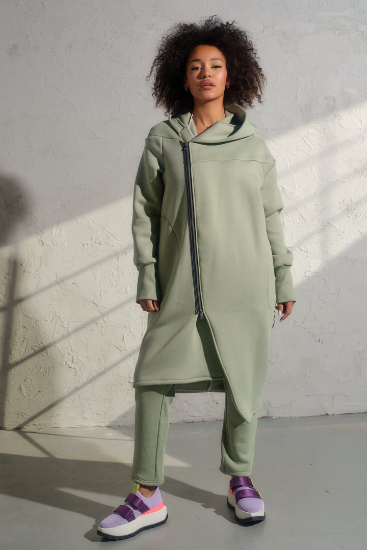 Asymmetrical organic cotton hoodie in Green Tea color