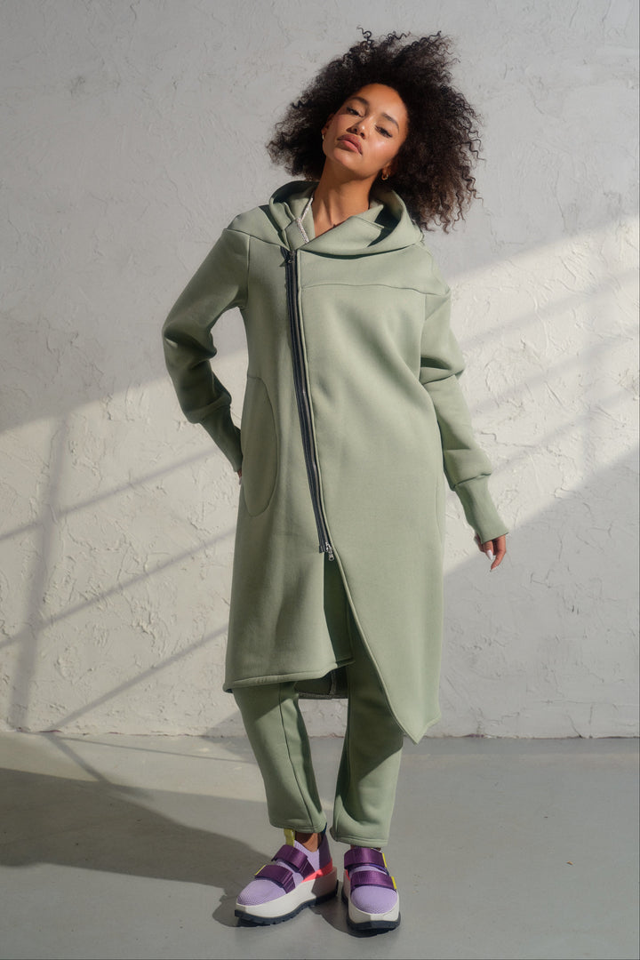 Asymmetrical organic cotton hoodie in Green Tea color