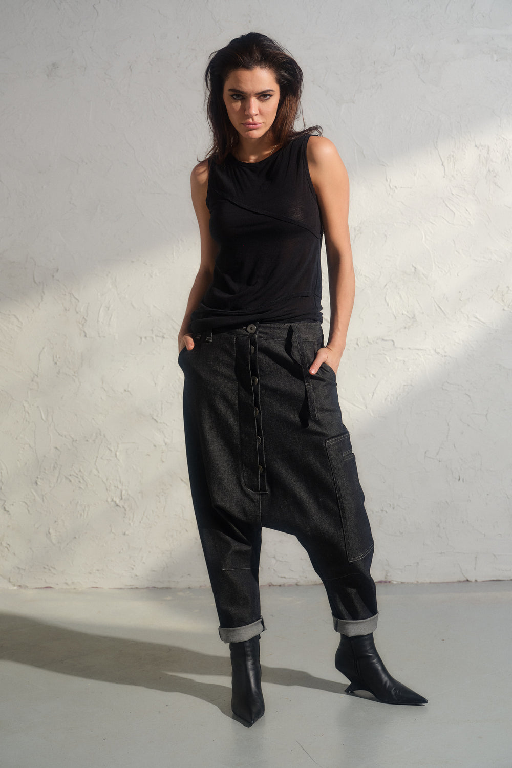 Avant garde denim harem pants with asymmetrical details