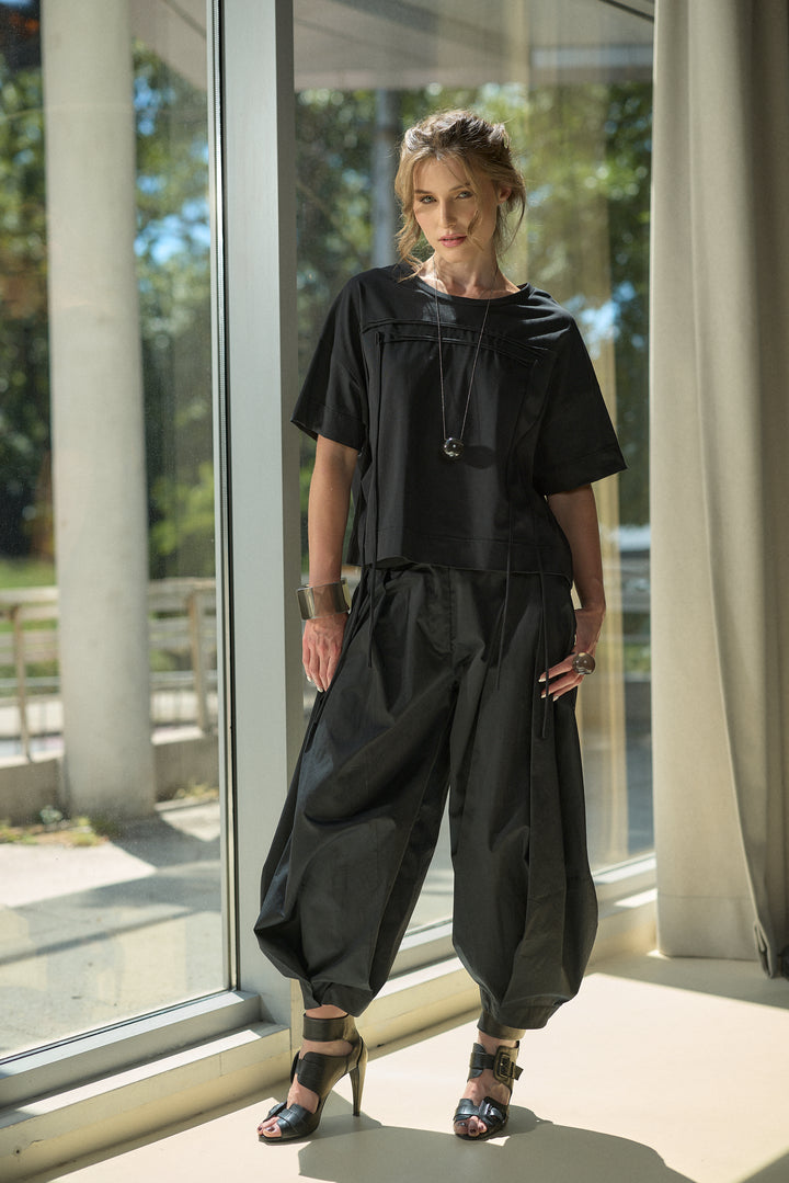 Schwarze Baggy-Hose aus Baumwolle