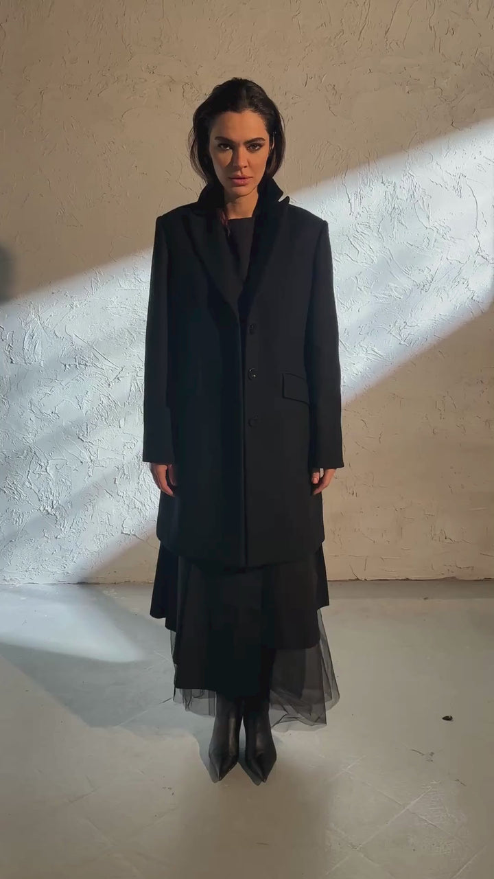 Minimalistic black wool coat