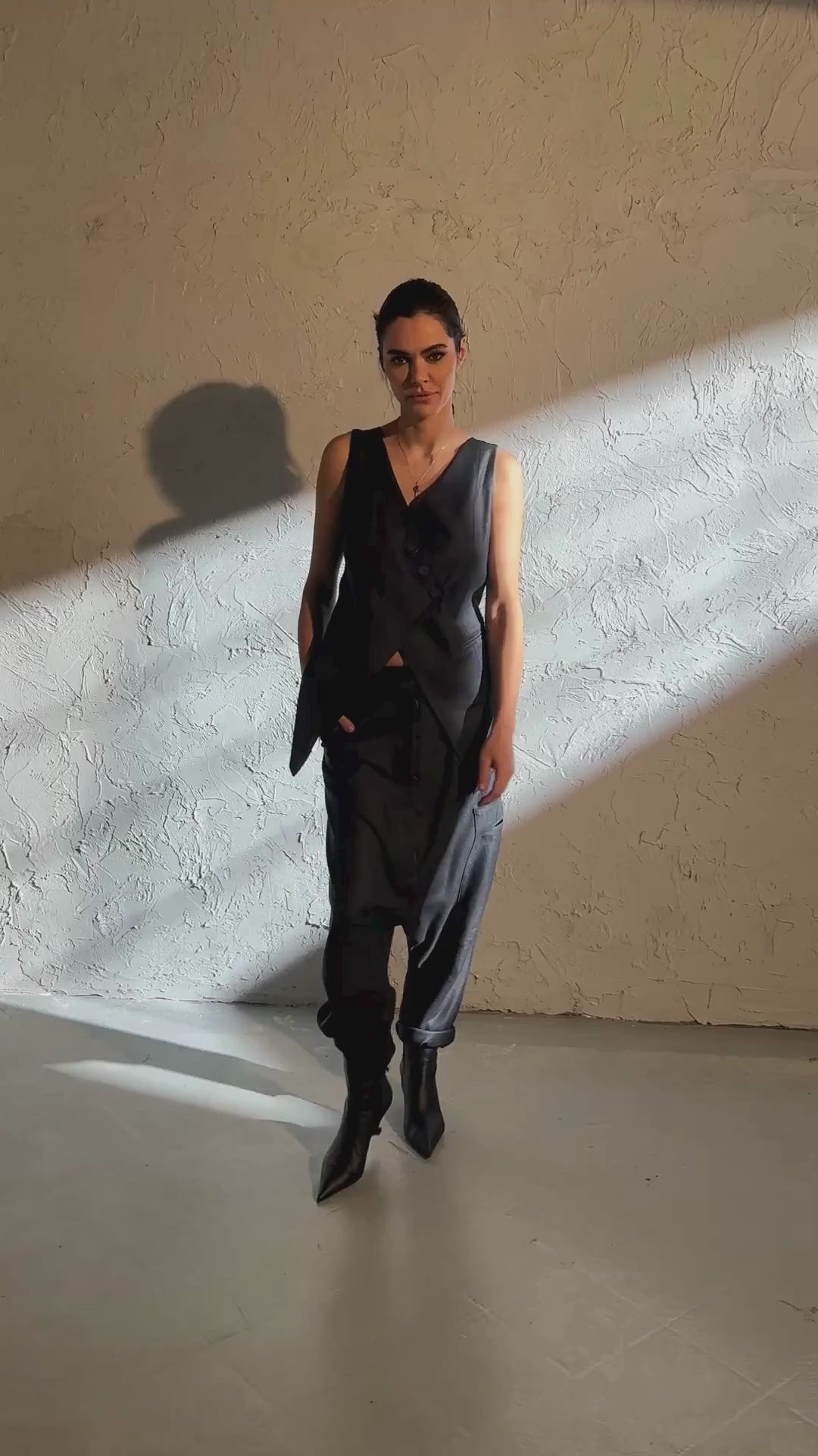 Merino wool baggy pants with asymmetrical details