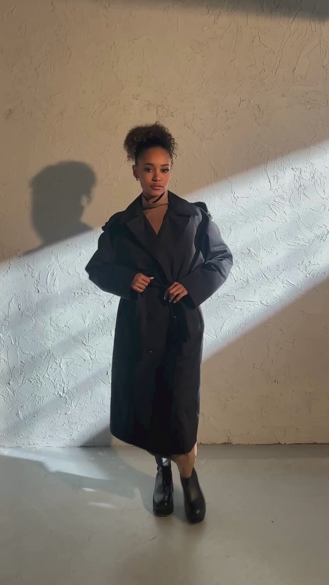 Double breasted trench coat in black